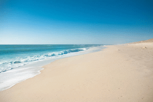 Empty Outer Banks beach in fall with sunny skies